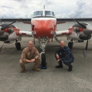 18. Navy lieutenants and brothers (left to right) Andrew and Damien Horvath in front of T-44 at Naval Air Station, Corpus Christi, Texas.